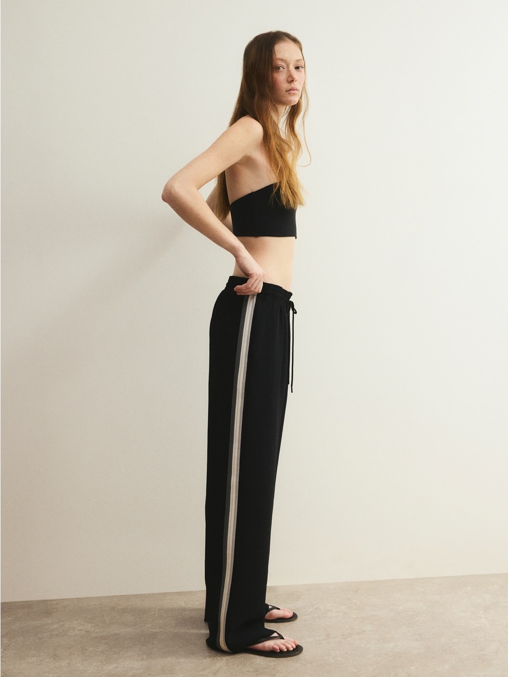 Aritzia Thesis Black Wide-Leg Pants with Cream Side Stripes